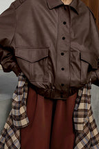 Locker geschnittene Jacke mit langen Ärmeln und Leder