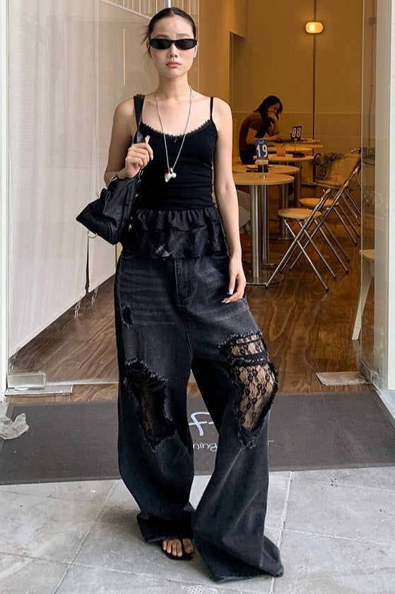Jeans mit weitem Bein und Spitze in Schwarz