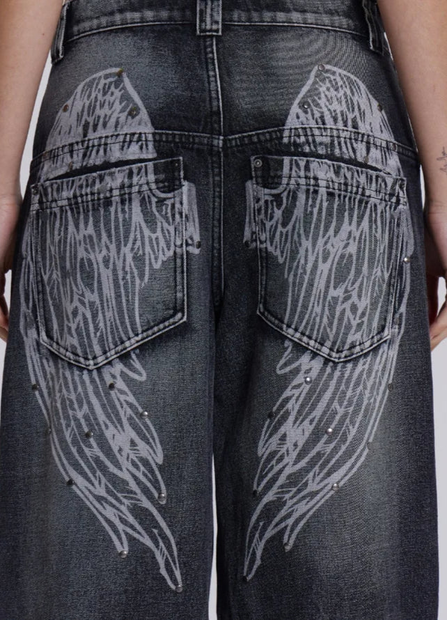 Jeans mit weitem Bein und Druck in Schwarz