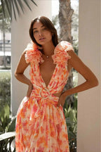 Kleid mit V-Ausschnitt, Blumenmuster und Rüschen