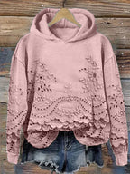 Gemütlicher Kapuzenpullover mit floralem Muster