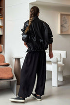 Jacke mit Kunstleder in Schwarz figurbetont