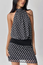 Figurbetontes Minikleid mit Neckholder und Punktemuster in Schwarz