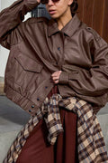 Locker geschnittene Jacke mit langen Ärmeln und Leder