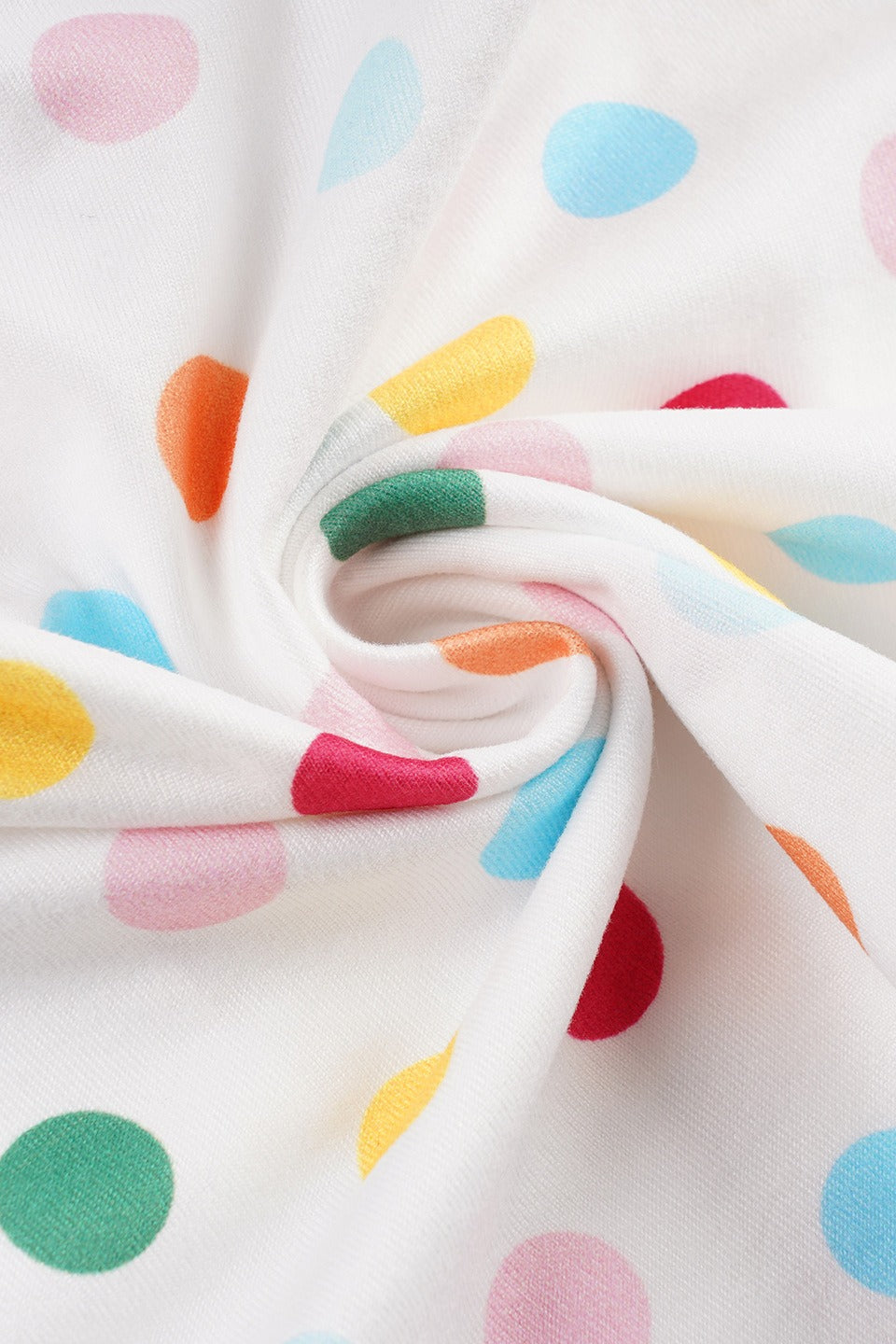 Figurbetontes Top mit Neckholder, kurzem Schnitt und Punktemuster in Weiß