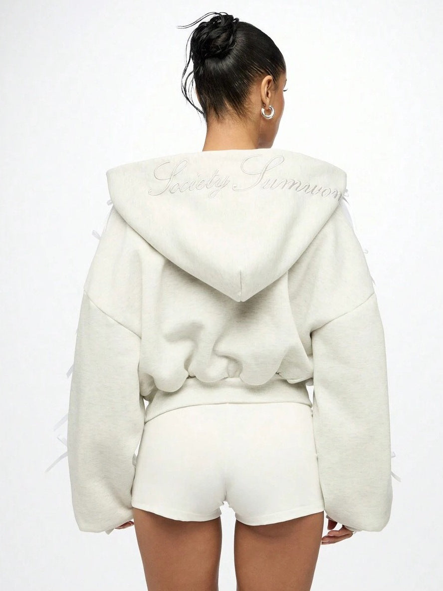 Hoodie mit Reißverschluss, Schleifendetail und Stickerei