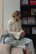 Pullover mit Trompetenärmeln, ausgestelltem Schnitt und Strickstruktur