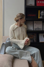 Pullover mit Trompetenärmeln, ausgestelltem Schnitt und Strickstruktur
