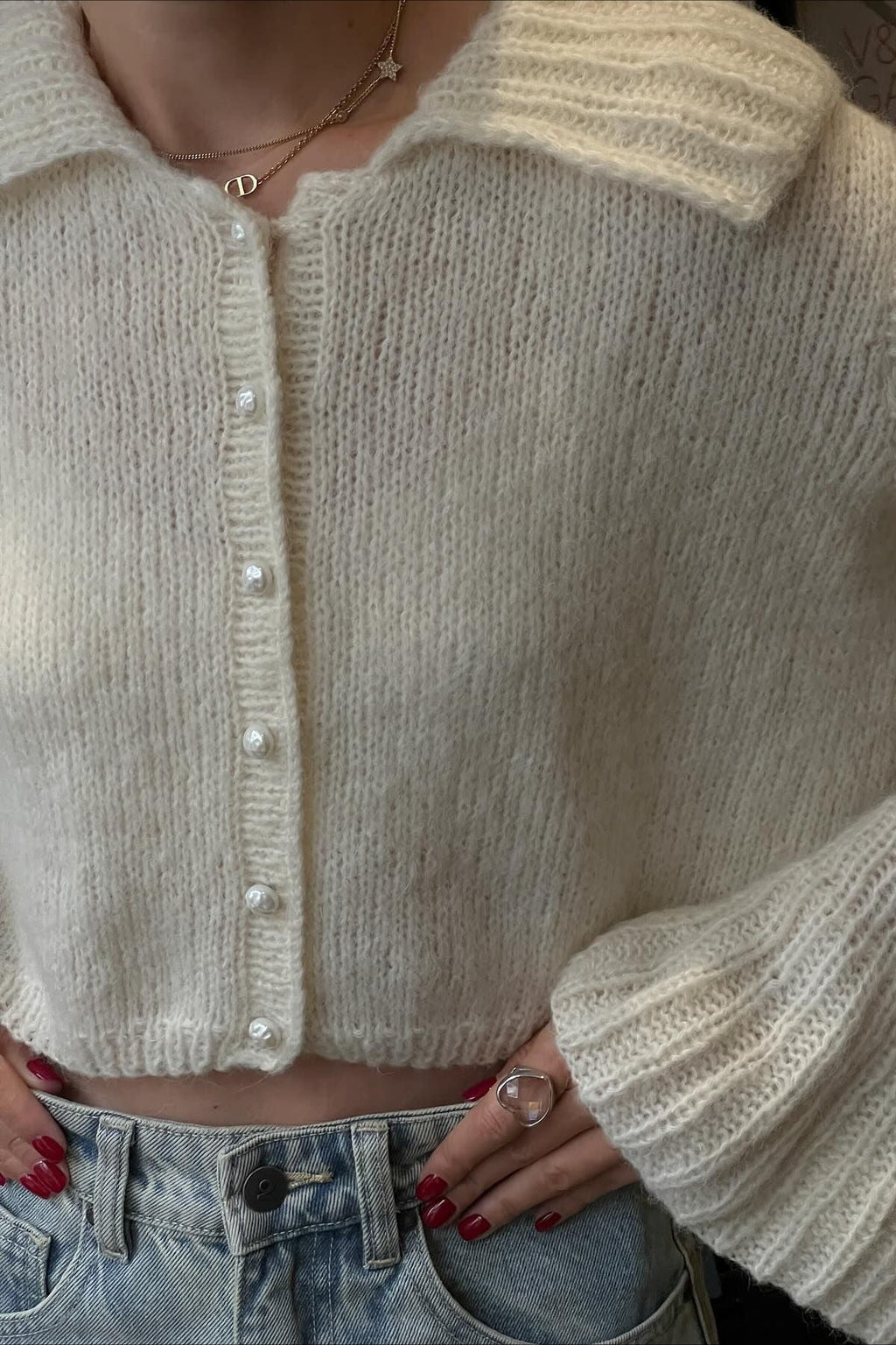 Pullover mit Trompetenärmeln, ausgestelltem Schnitt und Strickstruktur