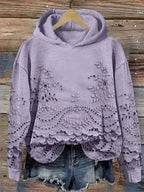 Gemütlicher Kapuzenpullover mit floralem Muster