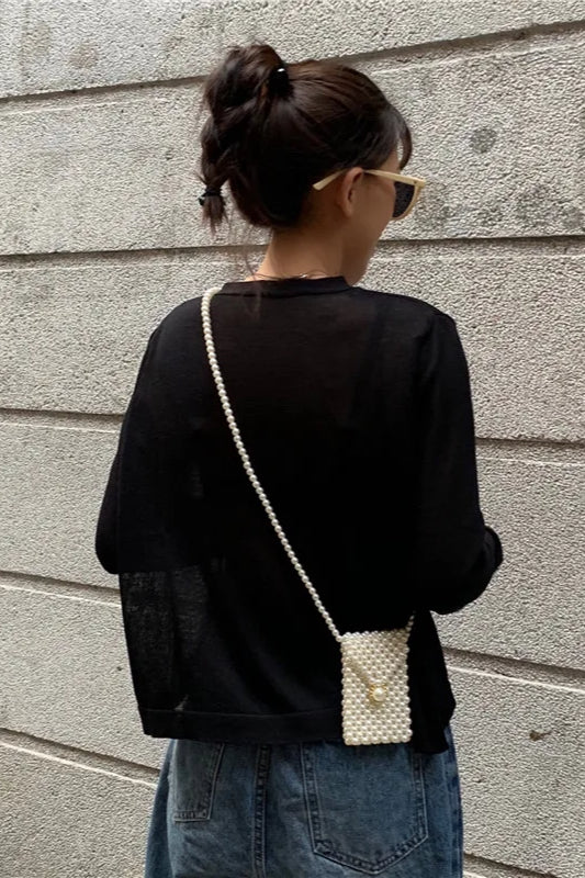 Strickjacke mit V-Ausschnitt und Strickstruktur in Lila