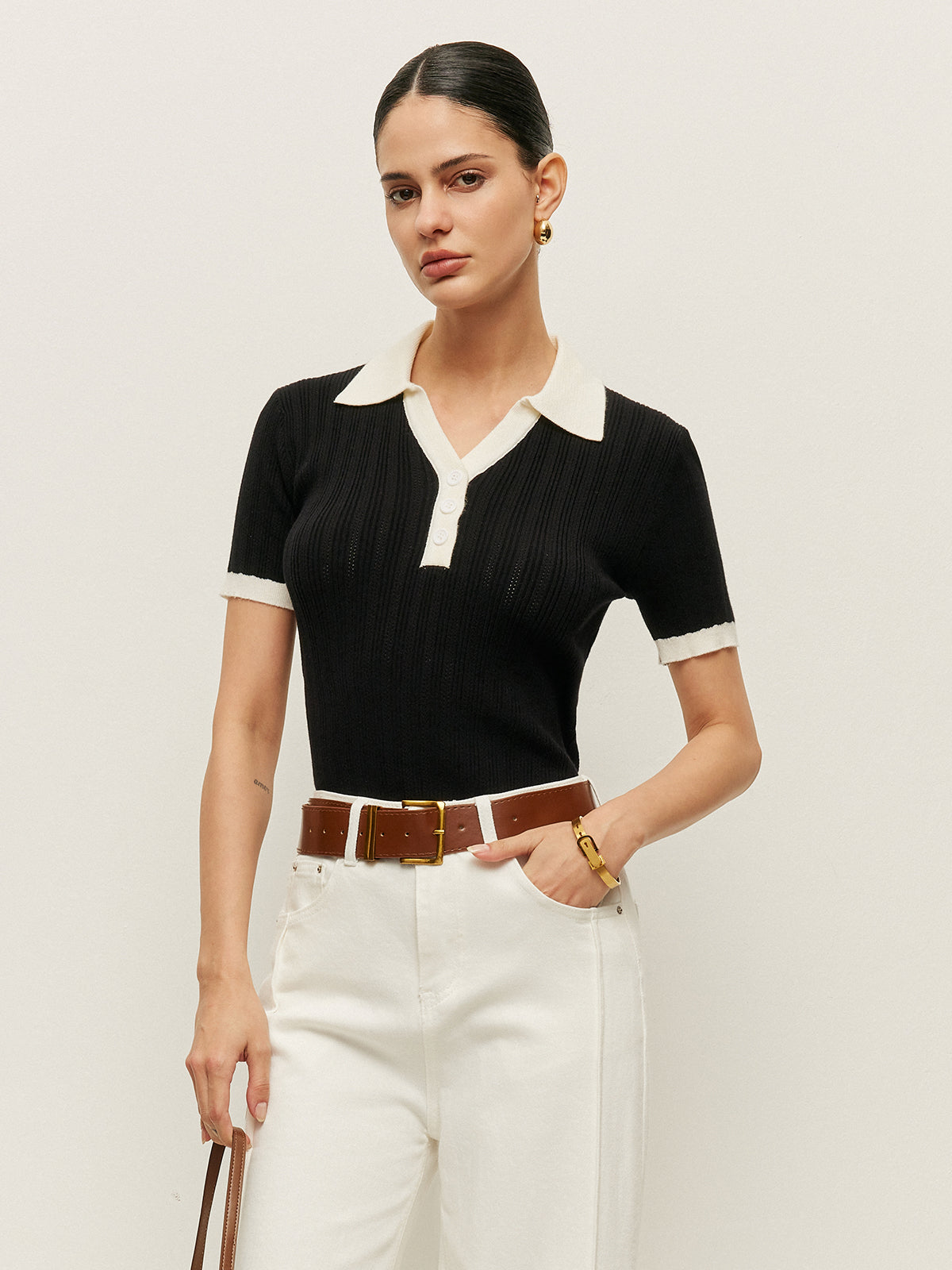 Top mit Knopfdetails und Strickstruktur