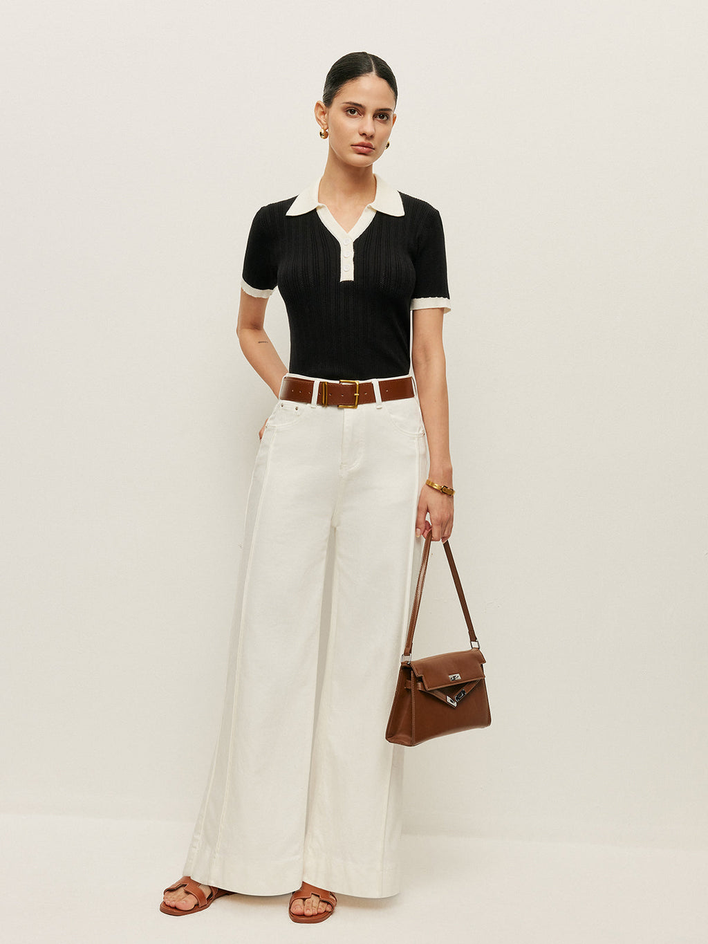 Top mit Knopfdetails und Strickstruktur