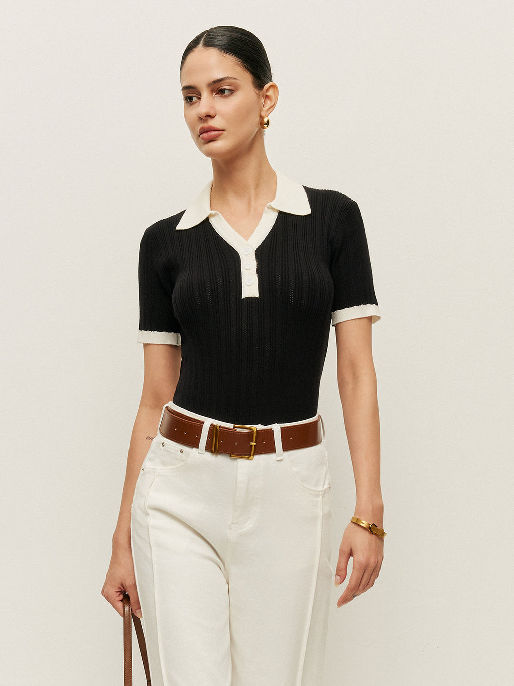 Top mit Knopfdetails und Strickstruktur