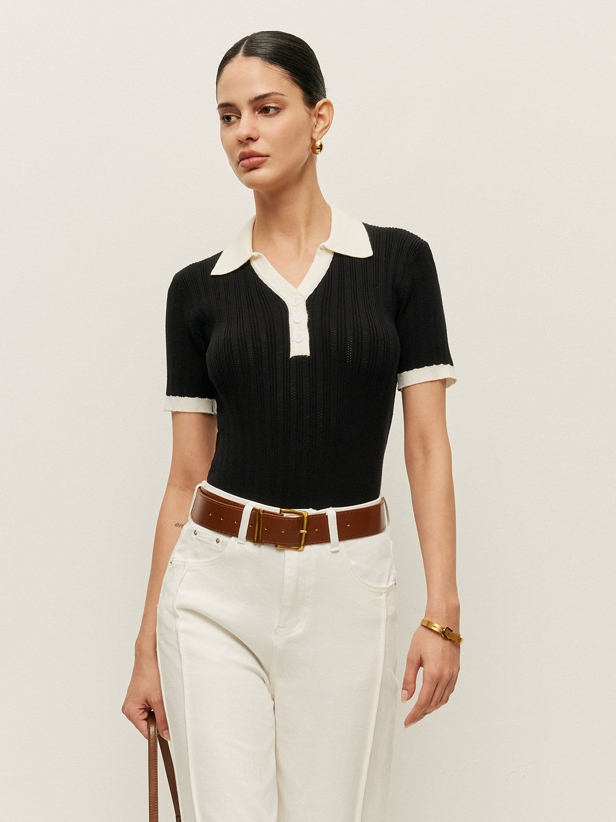 Top mit Knopfdetails und Strickstruktur