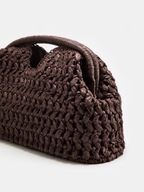 Clutch aus geflochtenem Stroh