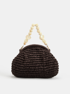 Handtasche aus geflochtenem Stroh mit Kettenriemen