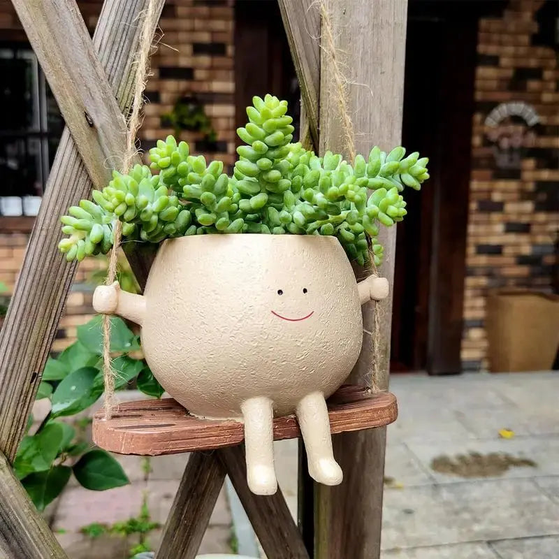 SwingPot: Hängender Blumentopf auf Schaukelsitz