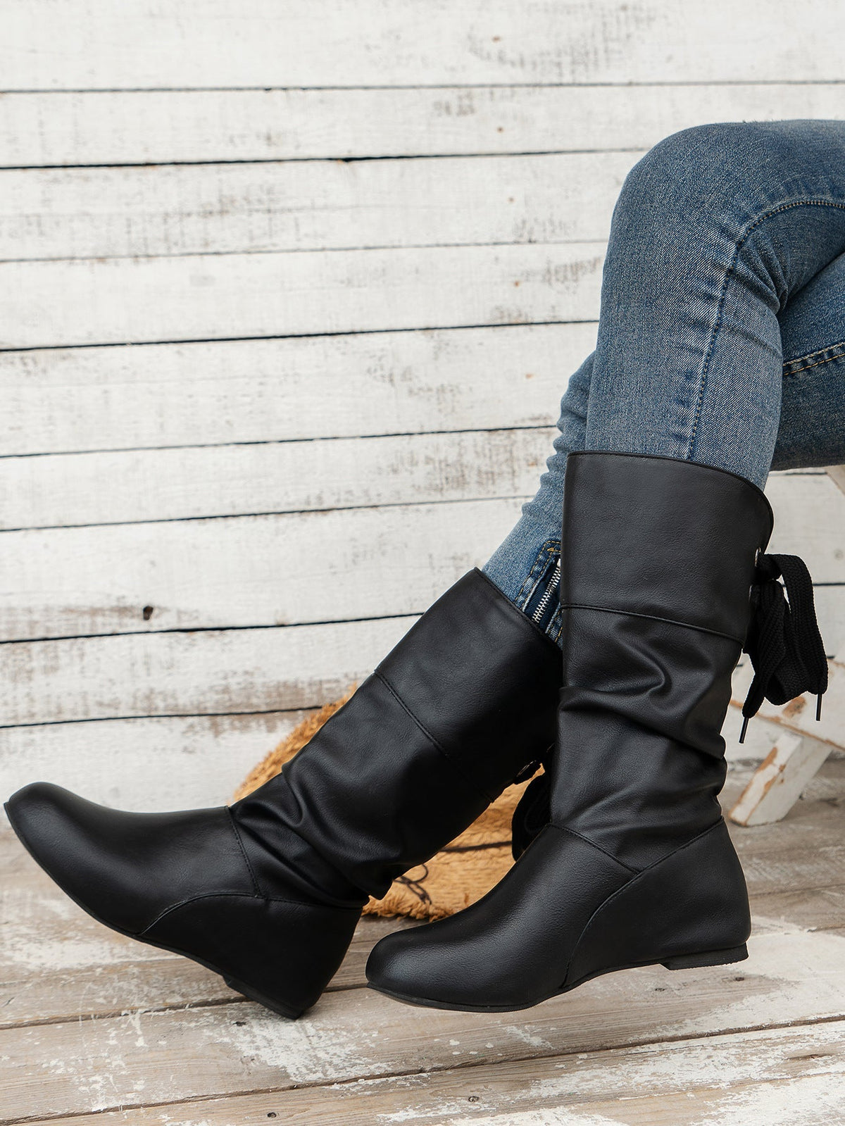 Wadenhohe Stiefel mit runder Zehenpartie