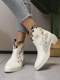 Chelsea-Boots in Schlangen-Optik mit Stickerei