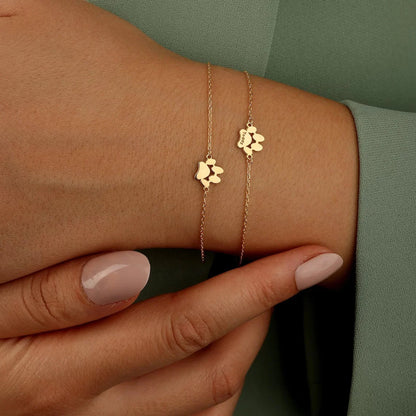 Liebenswerte Pfotenabdruck-Armband: Eine warme Erinnerung an deinen treuen Freund
