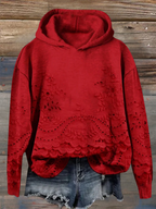 Gemütlicher Kapuzenpullover mit floralem Muster