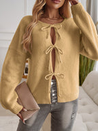 Locker geschnittener Pullover mit Bindedetail und Knopfdetails