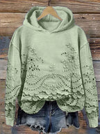 Gemütlicher Kapuzenpullover mit floralem Muster
