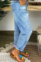 Low-Rise Straight-Leg-Jeans mit Used-Look und Knopfleiste