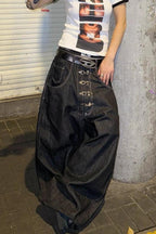Jeans mit weitem Bein und Knopfdetails
