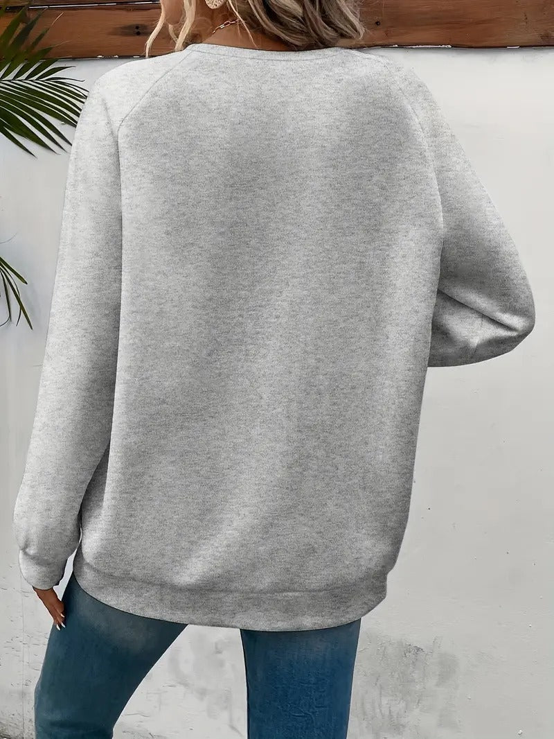Lässiger Pullover mit Herzmotiv