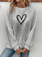 Lässiger Pullover mit Herzmotiv