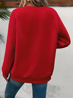 Lässiger Pullover mit Herzmotiv