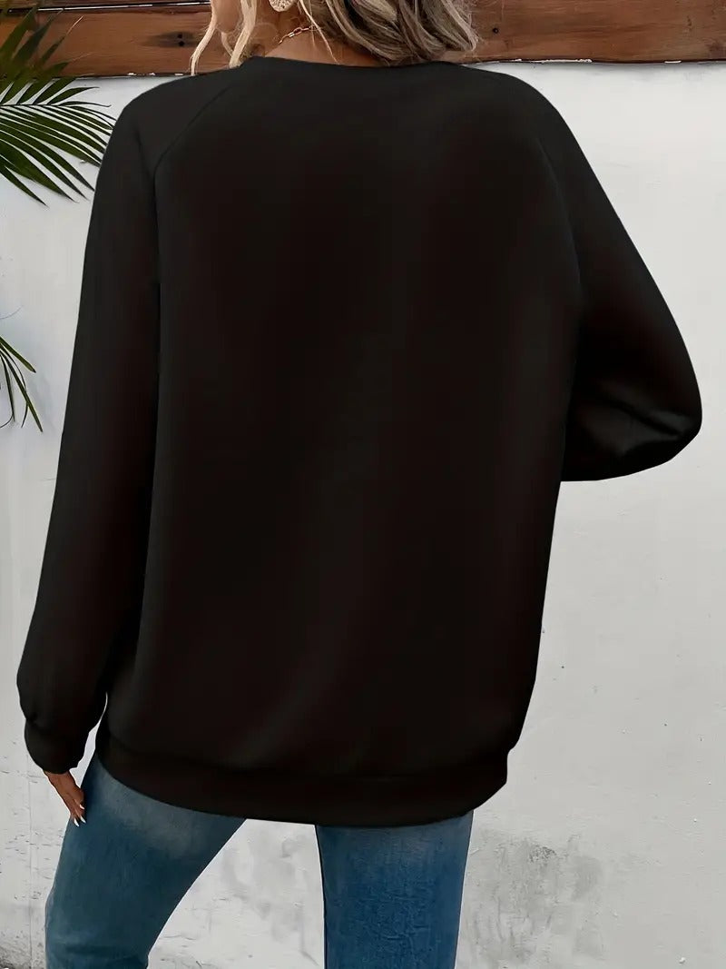 Lässiger Pullover mit Herzmotiv