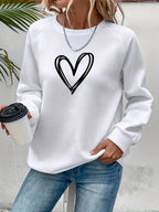 Lässiger Pullover mit Herzmotiv