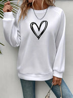 Lässiger Pullover mit Herzmotiv