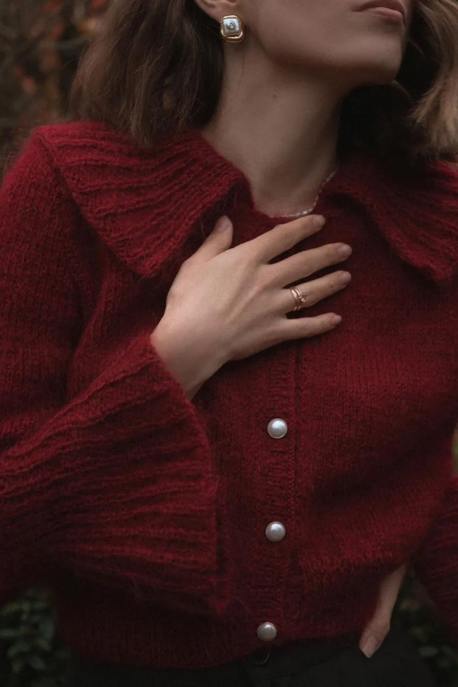 Pullover mit Trompetenärmeln, ausgestelltem Schnitt und Strickstruktur