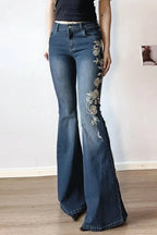 Jeans mit Stickerei in Blau