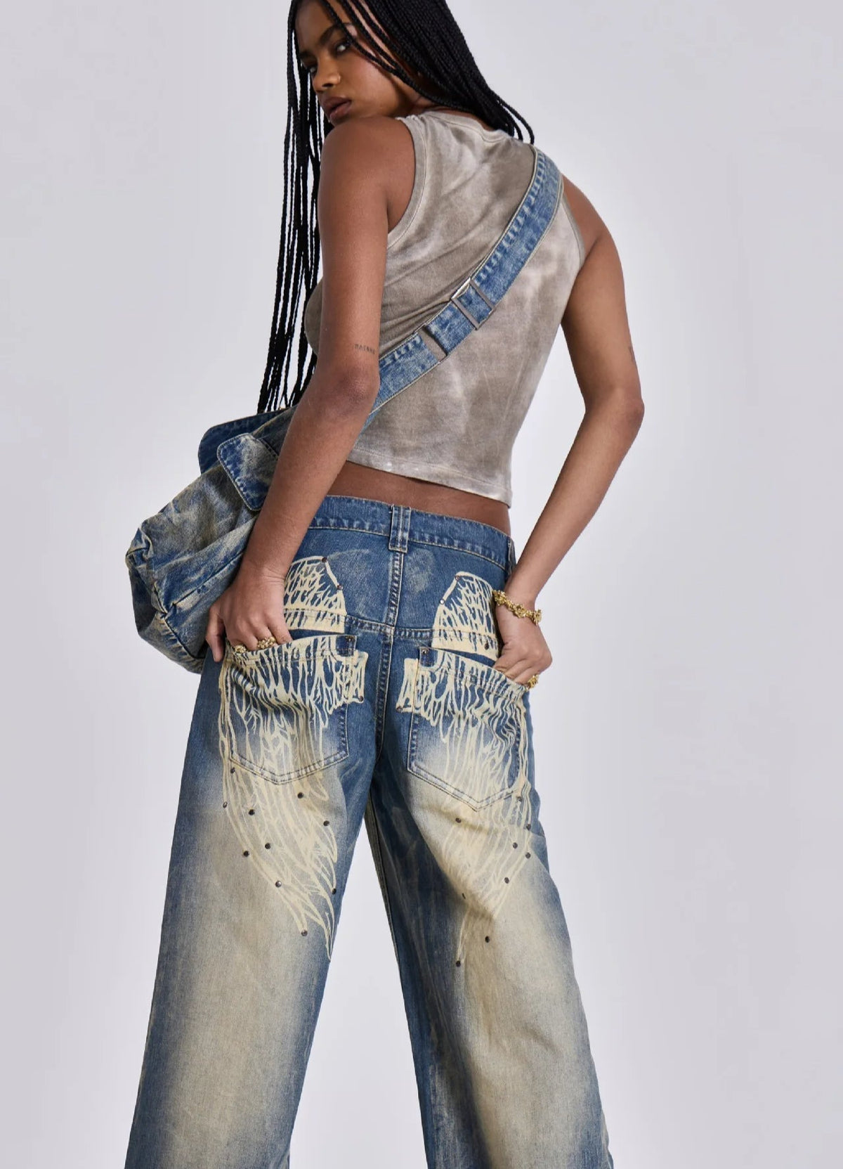 Jeans mit weitem Bein und Druck in Schwarz