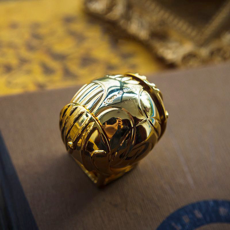 Goldene Flügel-Orb-Ringbox: Luxuriöse bewegliche Schmuckschatulle