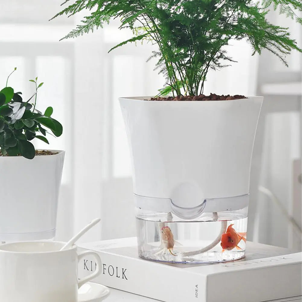 Selbstbewässernder Pflanzentopf – Stilvolle Kombination aus Pflanze sowie Mini-Aquarium
